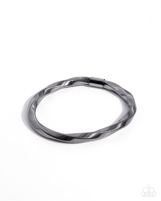 Twisted Temptress - Black - Paparazzi Bracelet